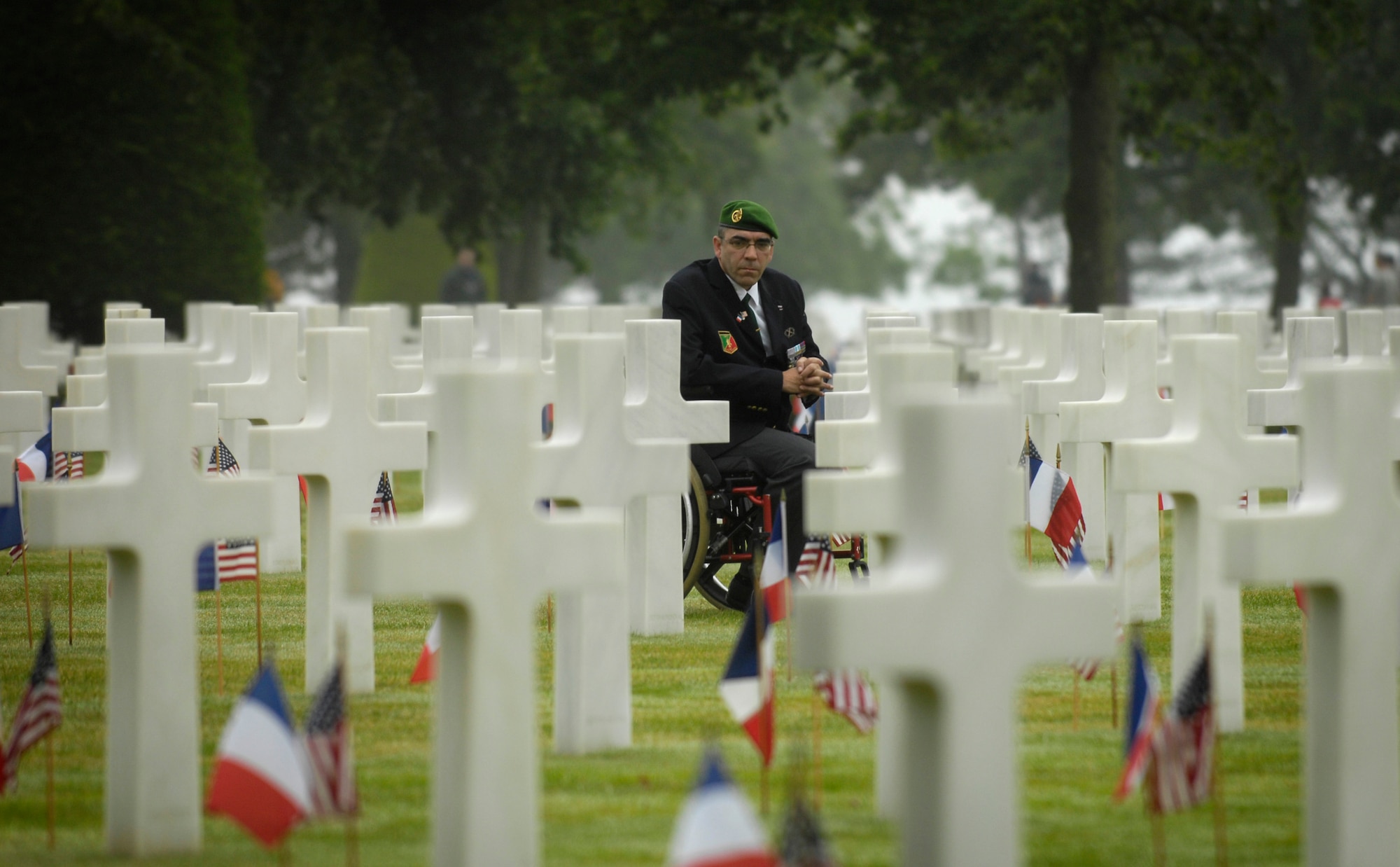 A U.S. veteran tours the American Cemetery during the 63rd Anniversary of D-Day June 6 in Normandy, France. (Defense Department photo/Cherie A. Thurlby) 
