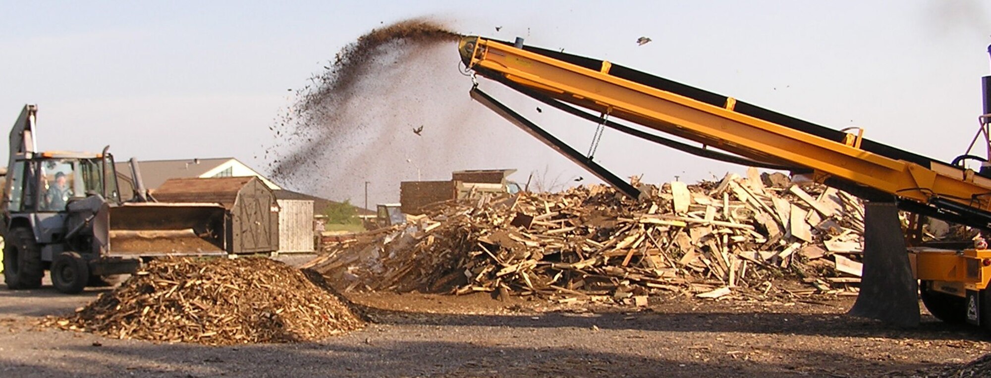 GRISSOM AIR RESERVE BASE, Ind., -- Piles of scrap wood and pallets are turned into usable dye-free mulch in Grissom's civil engineering compound. Grissom's recycling progam and 'green foot print' on the base and community has won numerous awards and accolades. (U.S. Air Force photo/Mr. Michael Woloshuck)