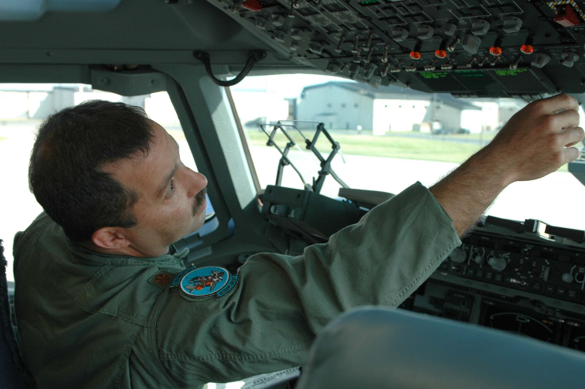 DOVER AIR FORCE BASE, Del. -- Maj. Pedro Ramos, 326th Airlift Squadron pilot, conducts a flight check June 5 for the squadron's first flight aboard Dover Air Force Base's new C-17, dubbed the "Spirit of the Constitution." Dover received its first C-17 Globemaster III June 4 during a delivery ceremony.The squadron belongs to the 512th Airlift Wing, which is an Air Force Reserve Command unit. (U.S. Air Force photo/1st Lt. Marnee A.C. Losurdo)