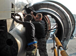 Senior Airman Vincent O'Hara, 437th Aircraft Maintenance Squadron aerospace propulsion specialist, and Tech. Sgt. Ian Kent, 437 AMXS aerospace propulsion specialist lead technician, actuate an engine thrust reverser of a Charleston C-17 on the flightline June 6.(U.S. Air Force photo/Airman 1st Class John White)