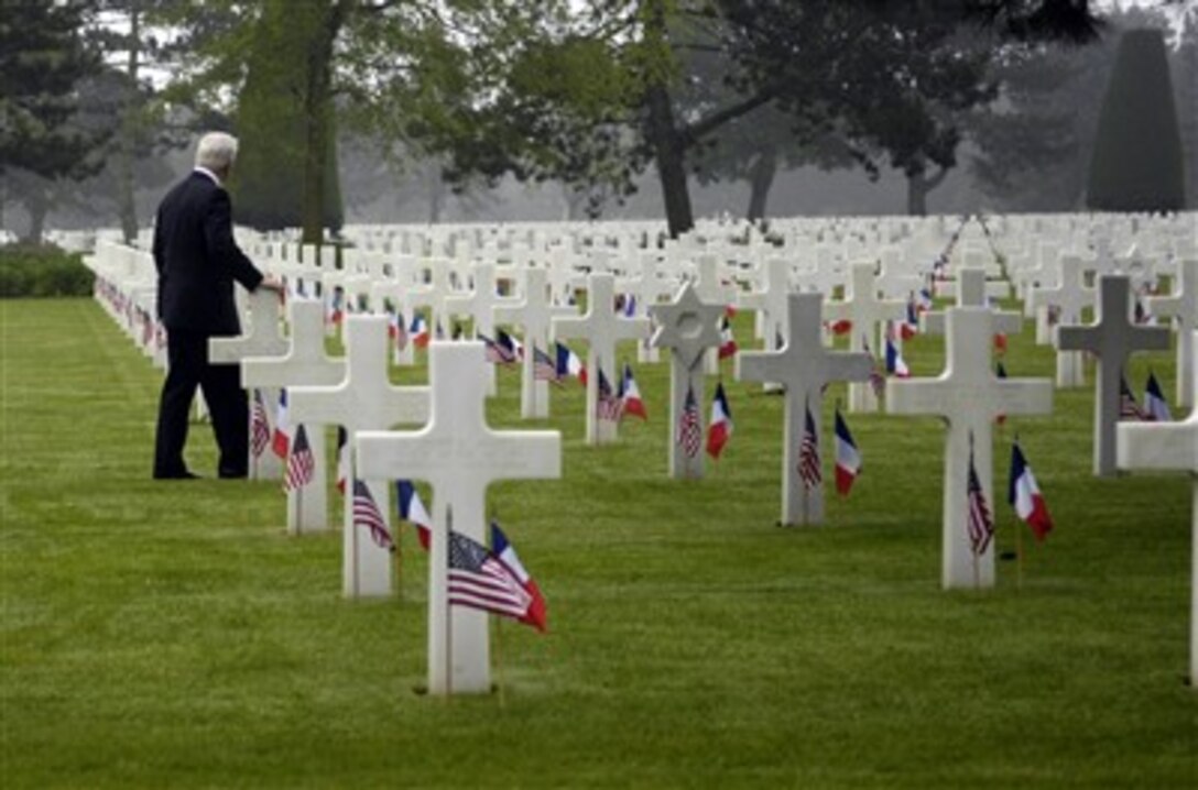 Secretary of Defense Robert M. Gates tours the American cemetery during a private moment at the 63rd Anniversary of the D-Day Invasion in Normandy, France, June 6, 2007.  