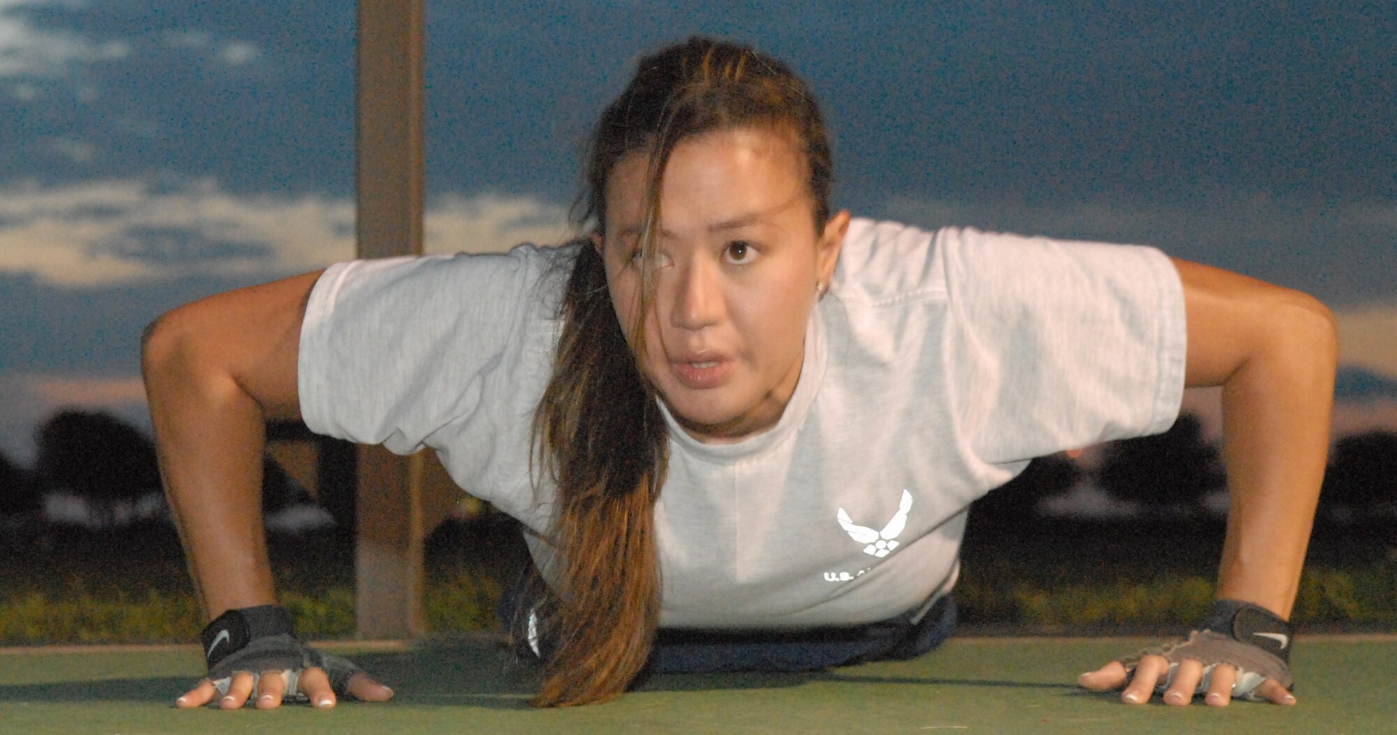 Tech. Sgt. Tenny Sharp, 316th Training Squadron, cranked out 179 crunches to go along with the 86 pushups she pumped out at the challenge. (U.S. Air Force photo by Tech. Sgt. Randy Mallard)