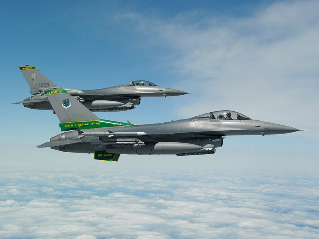 Two F-16 Fighting Falcons from the Vermont Air National Guard's 158th Fighter Wing participate in a special event held June 6 to promote Air Force Week New England which will take place in August.  (U.S. Air Force photo/Senior Master Sgt. Robert Sabonis)