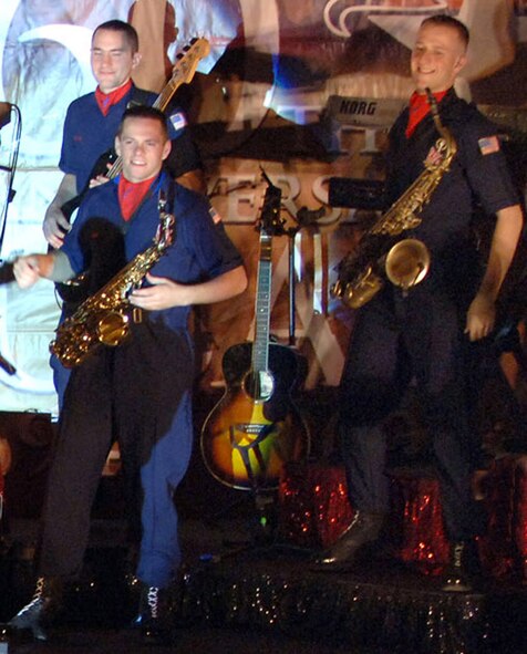 Saxophonist 2nd Lt. Adam Deem (front) and other members of Tops In Blue 2007 perform for servicemembers during a performance April 28 at Balad Air Base, Iraq. (U.S. Air Force photo/Staff Sgt. Michael R. Holzworth) 