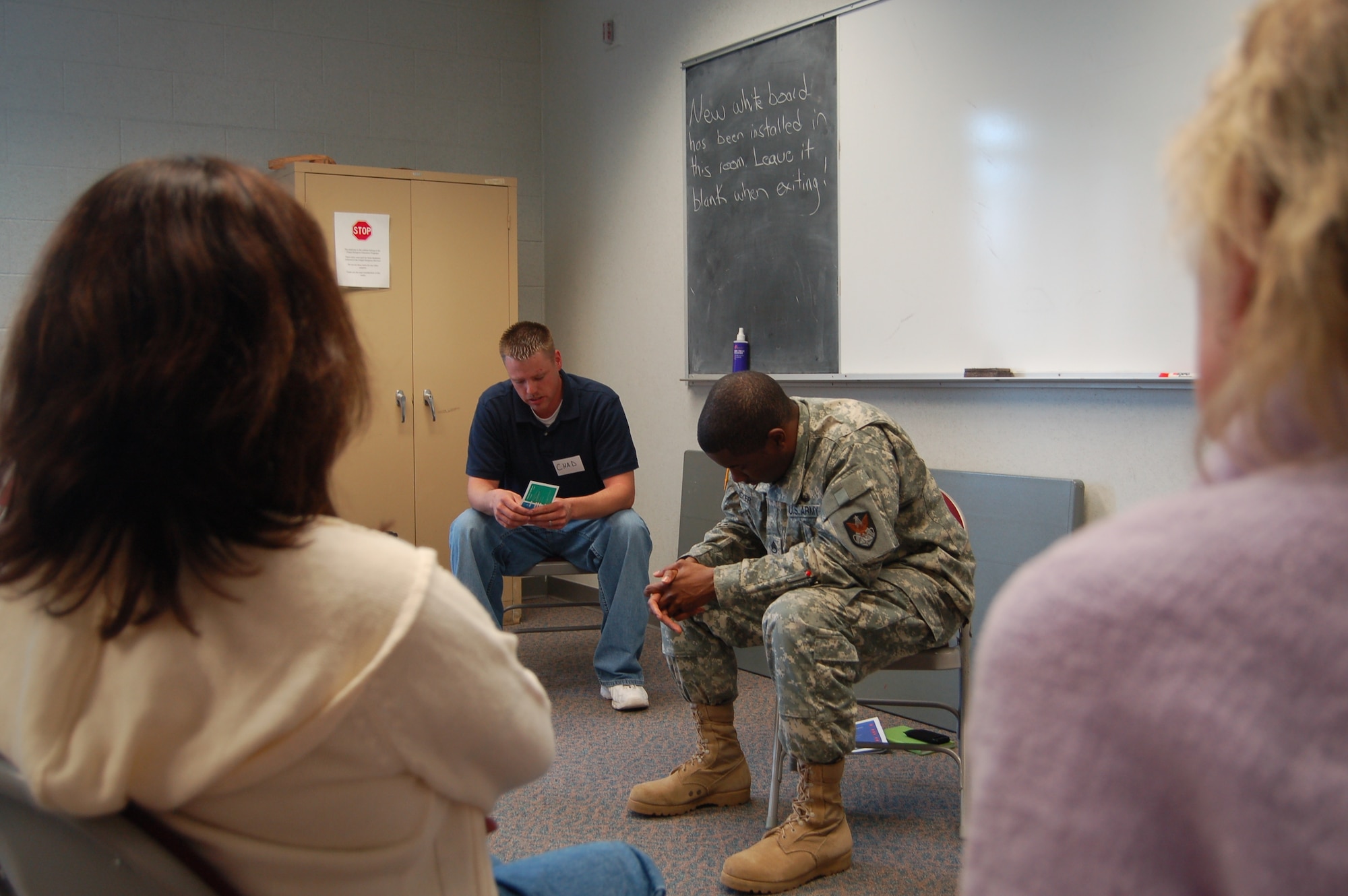 Participants at Peterson’s ASIST workshop use role-playing to practice suicide intervention skills. ASIST – Applied Suicide Intervention Skills Training – workshops are held four times a year to help servicemembers and base employees recognize warning signs and help their colleagues. (U.S. Air Force photo by Corey Dahl)