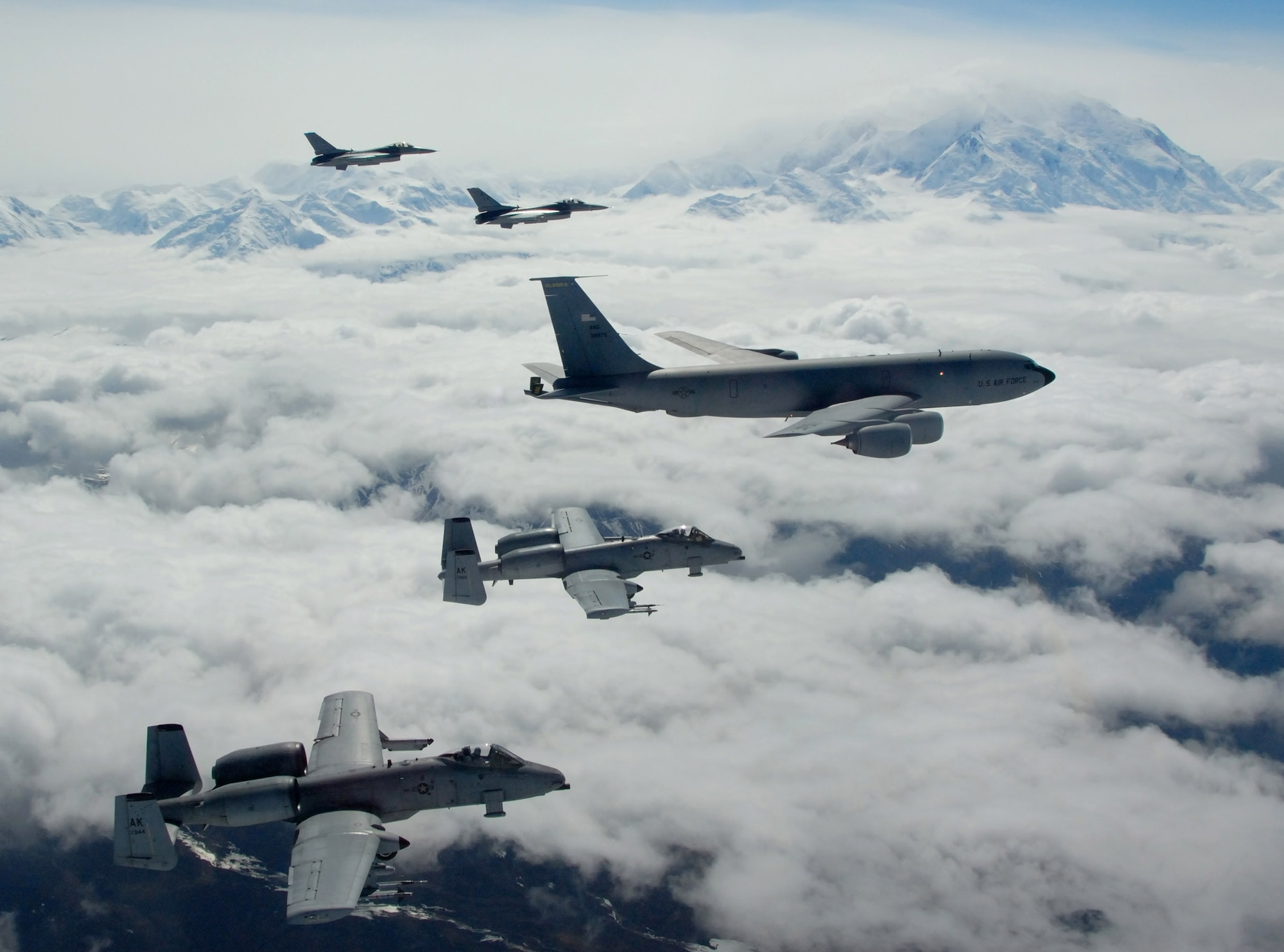 A KC-135 Stratotanker with the Alaska Air National Guard's 168th Air Refueling Wing  flies with two F-16 Fighting Falcons from the 18th Fighter Squadron and two A-10 Thunderbolt IIs from the 355th Fighter Squadron May 29 over Alaska. The five aircraft assigned to Eielson Air Force Base, Alaska, flew in formation for the last time due to the deactivation of the 18th and 355th Fighter Squadrons. (U.S. Air Force photo/Master Sgt. Rob Wieland)
