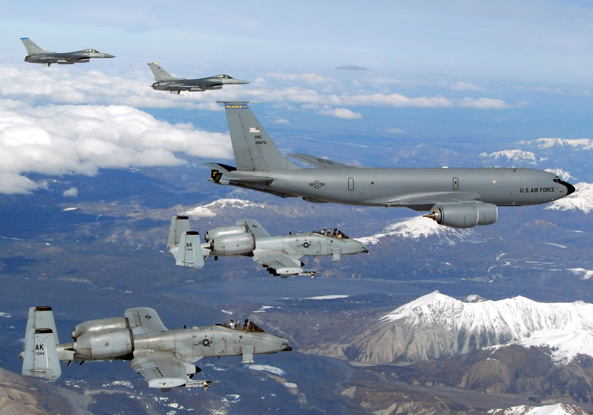 A KC-135 Stratotanker with the Alaska Air National Guard's 168th Air Refueling Wing  flies with two F-16 Fighting Falcons from the 18th Fighter Squadron and two A-10 Thunderbolt IIs from the 355th Fighter Squadron May 29 over Alaska. The five aircraft assigned to Eielson Air Force Base, Alaska, flew in formation for the last time due to the deactivation of the 18th and 355th Fighter Squadrons. (U.S. Air Force photo/Master Sgt. Rob Wieland)
