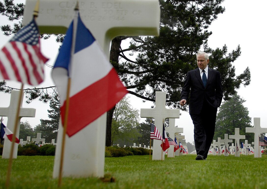 Secretary of Defense Robert M. Gates tours the American Cemetery in Normandy, France, during the 63rd Anniversary of D-Day June 6. (Defense Department photo/Cherie A. Thurlby)