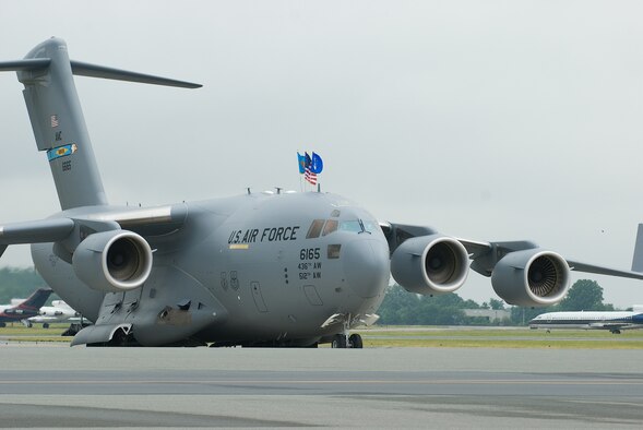 DOVER AIR FORCE BASE, Del. -- The 436th Airlift Wing's first C-17 arrival ceremony took place in Building 706, June 4. The C-17 Globemaster III, tail number 6165, is the first of 13 C-17s assigned to Dover AFB. Officiating officer was Gen. Duncan McNabb, Air Mobility Command commander. (U.S. Air Force photo/Roland Balik)