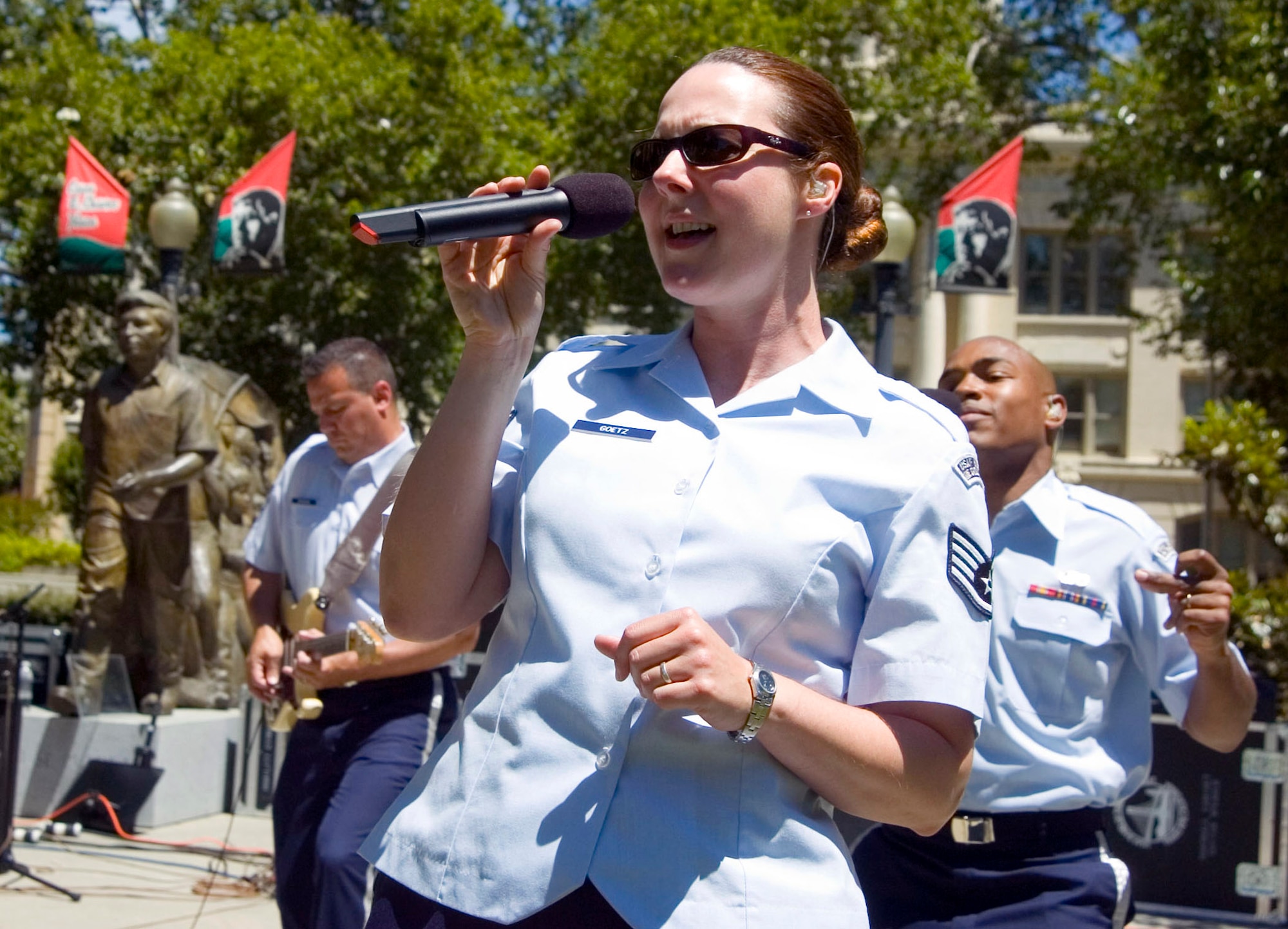 Staff Sgt. Paula Goetz of the Air Force Band of the Golden West from Travis Air Force Base, Calif., sings in the Cesar Chavez Plaza as part of Air Force Week June 7 in Sacramento, Calif. (U.S. Air Force photo/Staff Sgt. Joseph Prouse)
