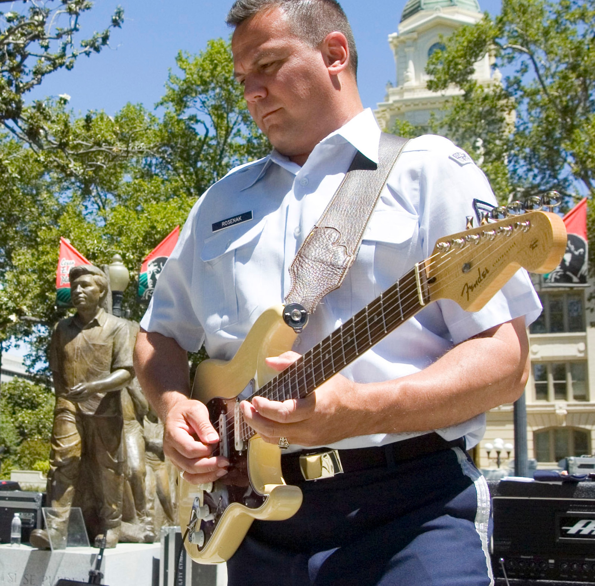 Guitarist Tech. Sgt. Gary Rosenak of the Air Force Band of the Golden West from Travis Air Force Base, Calif., performs in the Cesar Chavez Plaza as part of Air Force Week June 7 in Sacramento, Calif. (U.S. Air Force photo/Staff Sgt. Joseph Prouse) 
