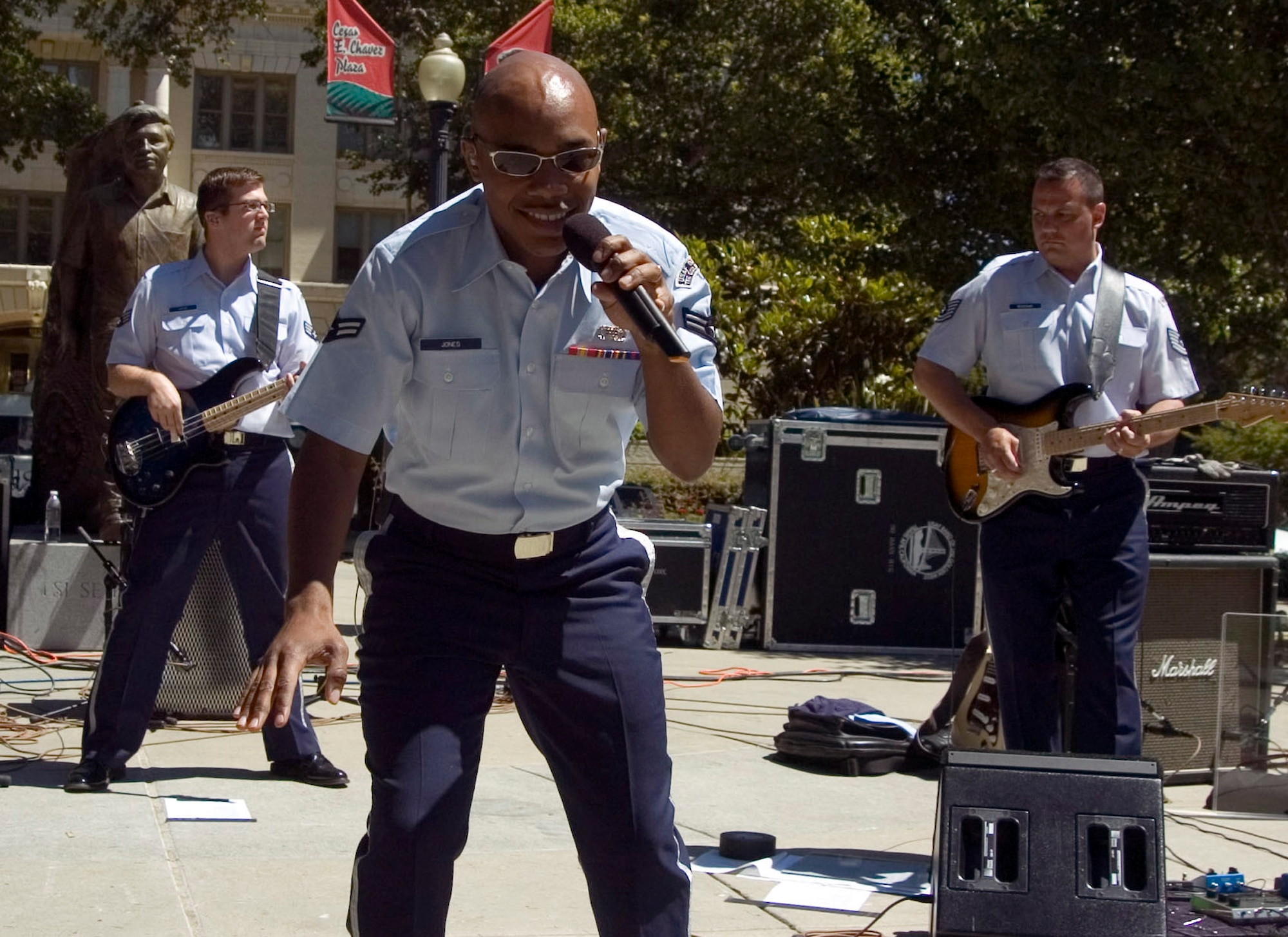 (From left to right) Senior Airman Jason Hafer Airman, 1st Class Andrew Jones and Tech. Sgt. Gary Rosenak of the Air Force Band of the Golden West from Travis Air Force Base, Calif., perform in the Cesar Chavez Plaza as part of Air Force Week June 7 in Sacramento, Calif. (U.S. Air Force photo/Staff Sgt. Joseph Prouse)
