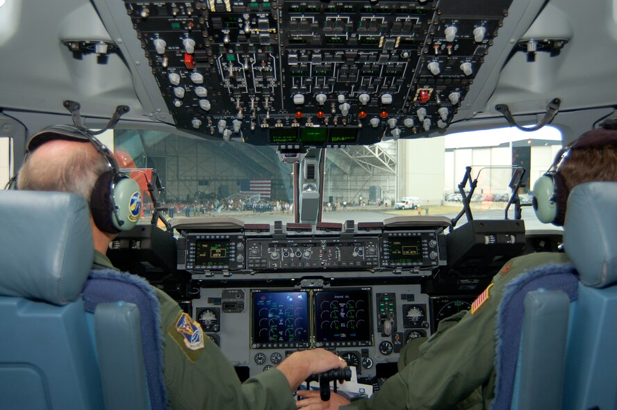 DOVER AIR FORCE BASE, Del. -- Gen. Duncan McNabb, Air mobility Command commander, and Maj. Justin Riddle, 3rd Airlift Squadron taxi the Spirit of the Constitution to an awaiting crowd at Building 706 for the C-17 Arrival Ceremony June 4. The Globemaster III is the first of 13 C-17s Dover AFB will recieve over the next year. (U.S. Air Force photo/ 2nd Lt. Nicole Langley)
