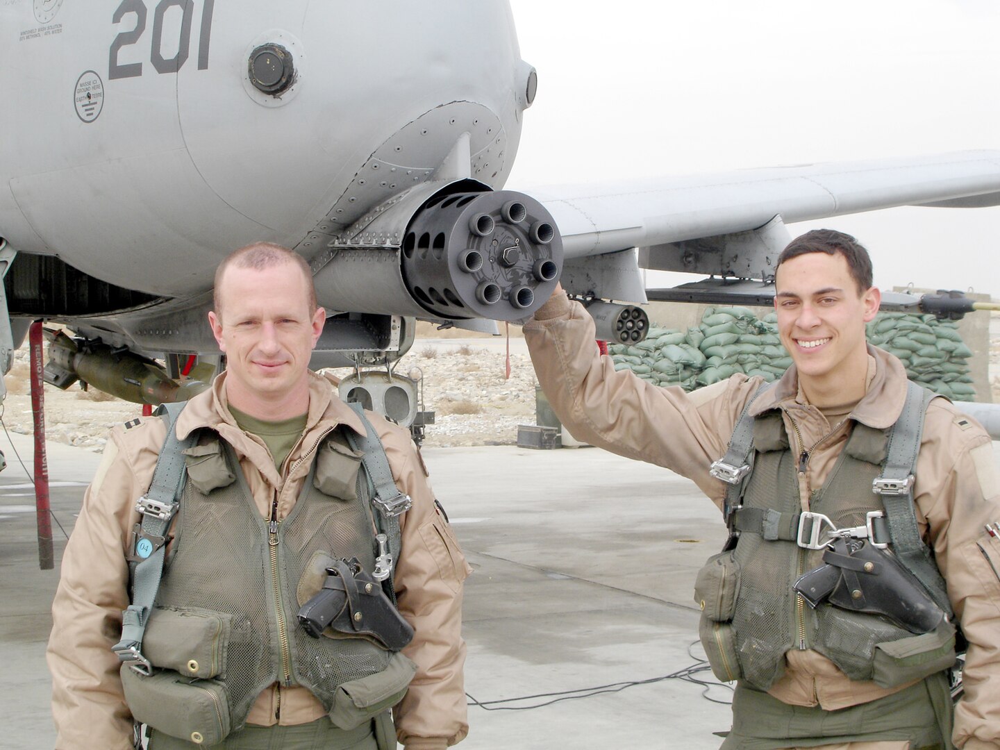 Major Steven Raspet (left), 559th Flying Training Squadron flight commander, and then 1st Lieutenant Andrew Tenebaum, stand beside the A-10 Thunderbolt aircraft the pair flew in Afghanistan. Major Raspet will be presented the Combat Action Medal June 12 at the Air Force Memorial in Arlington, Va. (Courtesy photo)                             