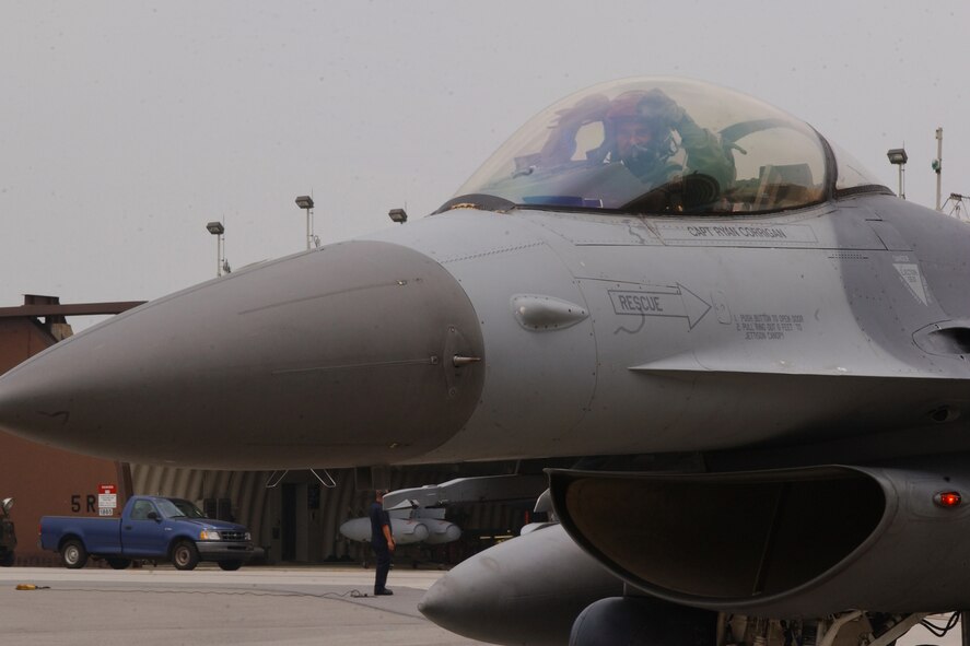 OSAN AIR BASE, Republic of Korea -- Lt. Col. Mark DeLong, 51st Operations Group deputy commander, reached the 3,000 hour milestone in the F-16 Fighting Falcon. He was greeted by wing leadership upon his return to Osan. (U.S. Air Force photo by Airman Jason Epley)