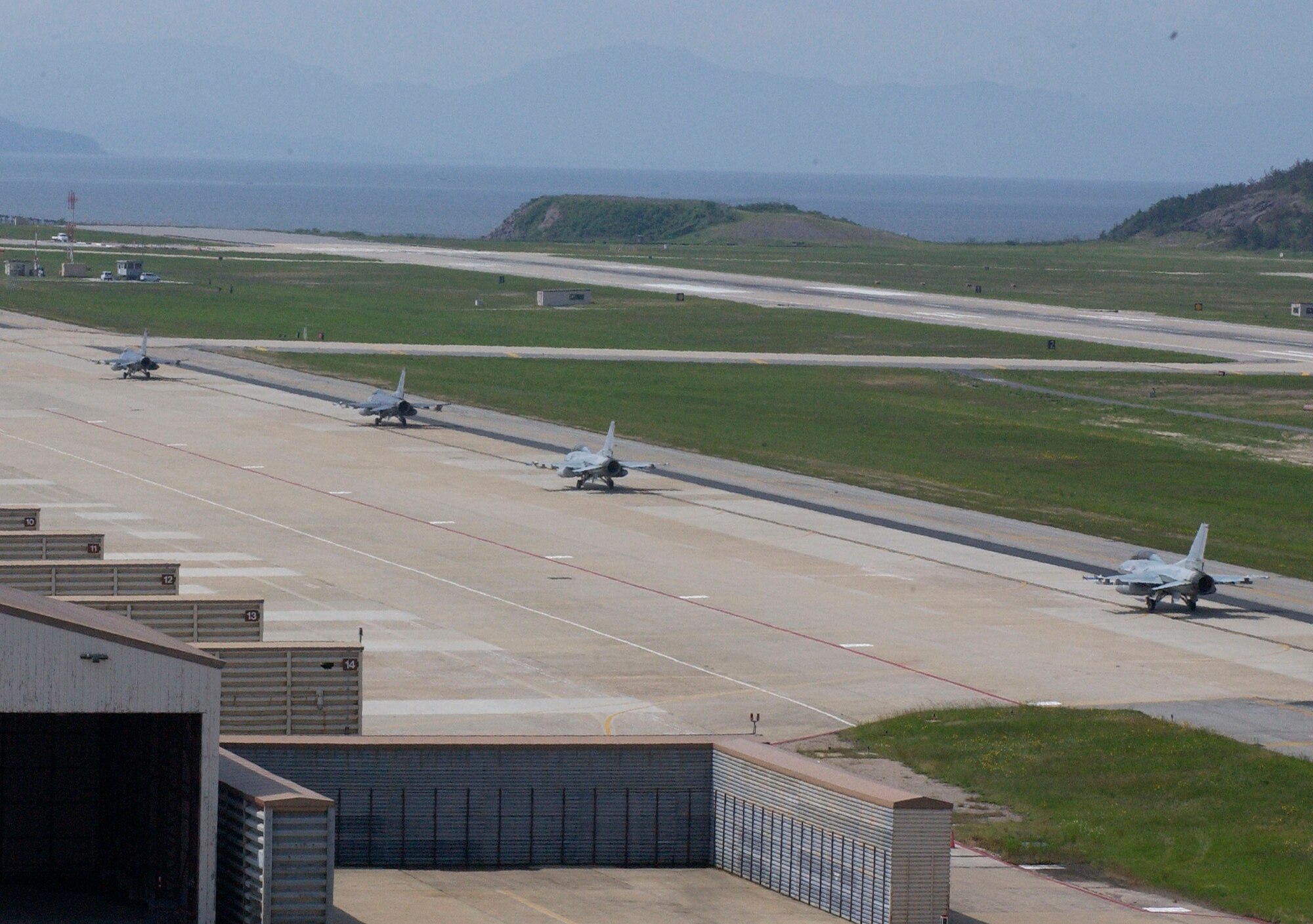 KUNSAN AIR BASE, Republic of Korea -- A group of F-16s from the 8th Fighter Wing and the Republic of Korea Air Force's 111th Fighter Squadron prepare to take off from Kunsan Air Base for a joint training exercise June 8. This is the first time since the 111th FS moved here that the two units have briefed, flown and debriefed together on a dedicated mission. (U.S. Air Force photo by Staff Sgt. Darcie Ibidapo)