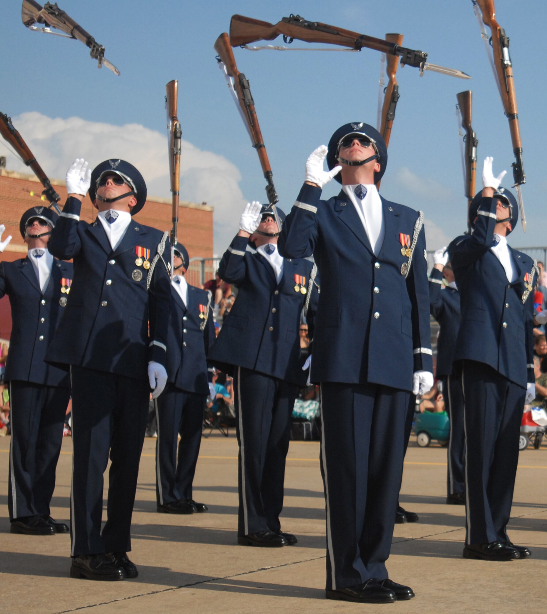TINKER AFB, Okla. - Air Force Honor Guard Drill Team members, SrA Raymond Testo and A1C Michael McCabe, perform the double comeback maneuver at Tinker AFB's Star Spangled Salute. The Drill Team is the traveling component of the Air Force Honor Guard and tours Air Force bases world wide showcasing the precision of today's Air Force to recruit, retain, and inspire Airmen for the Air Force mission. (U.S. Air Force Honor Guard photo by Senior Airman Nestor Bauer)(Released)