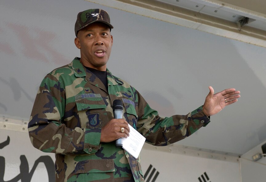 KUNSAN AIR BASE, Republic of Korea -- Col. CQ "Wolf" Brown, 8th Fighter Wing commander, addresses Airmen during a Wolf Call June 8 here. Colonel Brown discussed his four personal tenants of leadership -- to execute at a high standard, be disciplined in execution, pay attention to detail and to have fun. This is Colonel Brown's first Wolf Call since becoming the wing commander last month. (U.S. Air Force photo by Staff Sgt. Darcie Ibidapo)