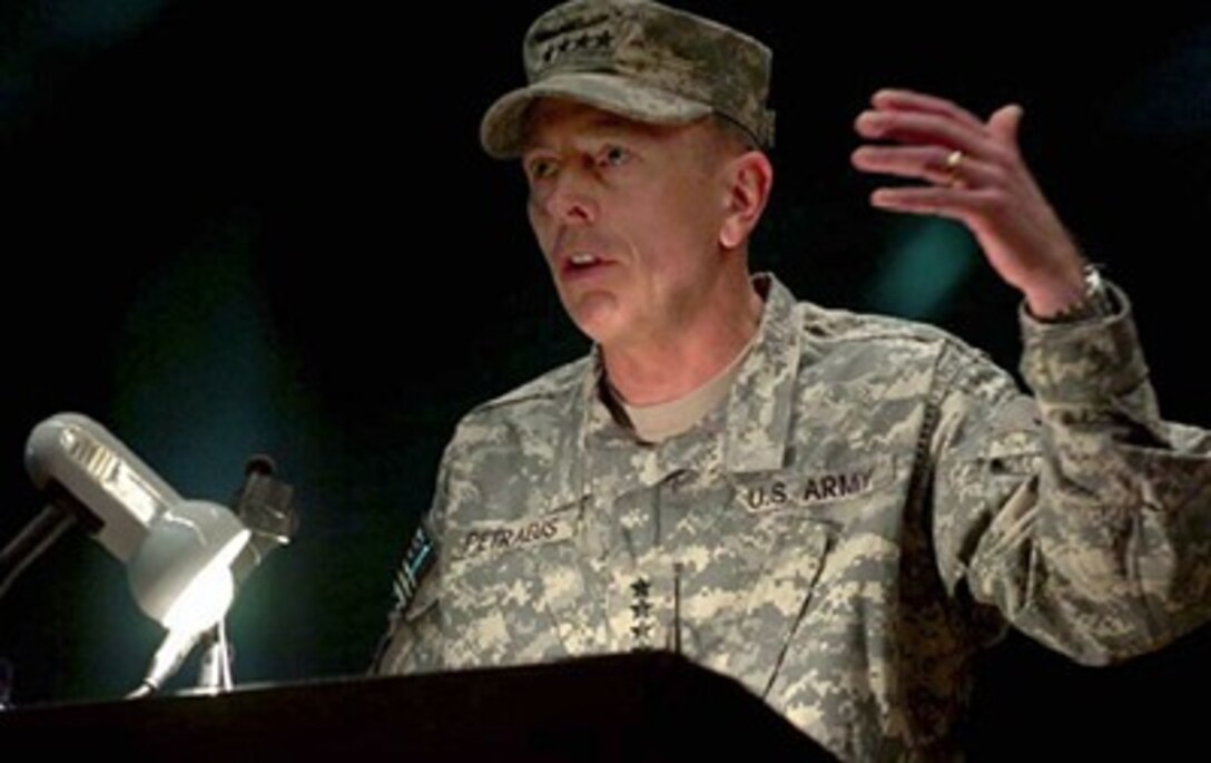 U.S. Army Gen. David H. Petraeus, Multi-National Force-Iraq commander, addresses those gathered during a change of command ceremony for Multi-National Security Transition Command - Iraq, June 10, 2007. During the ceremony, Lt. Gen. Martin E. Dempsey relinquished command to Lt. Gen. James M. Dubik.