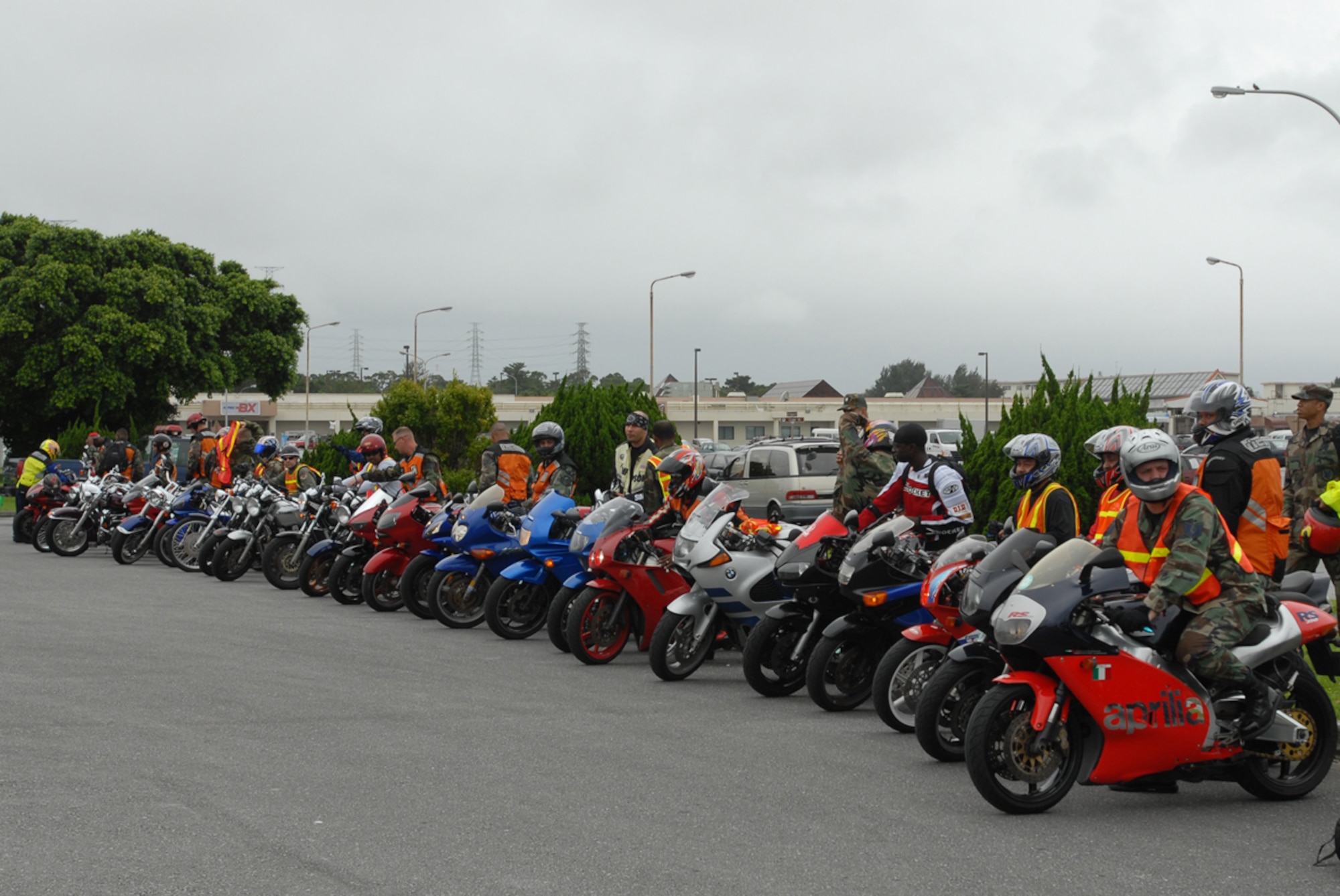 Motorcyclists from Kadena Air Base, Japan, gather for the first annual Motorcycle Group Ride June 5. About 75 people participated in the ride which followed a motorcycle all-call where all base riders were given the latest mishap prevention information.
(U.S. Air Force/Airman 1st Class Kasey Zickmund)