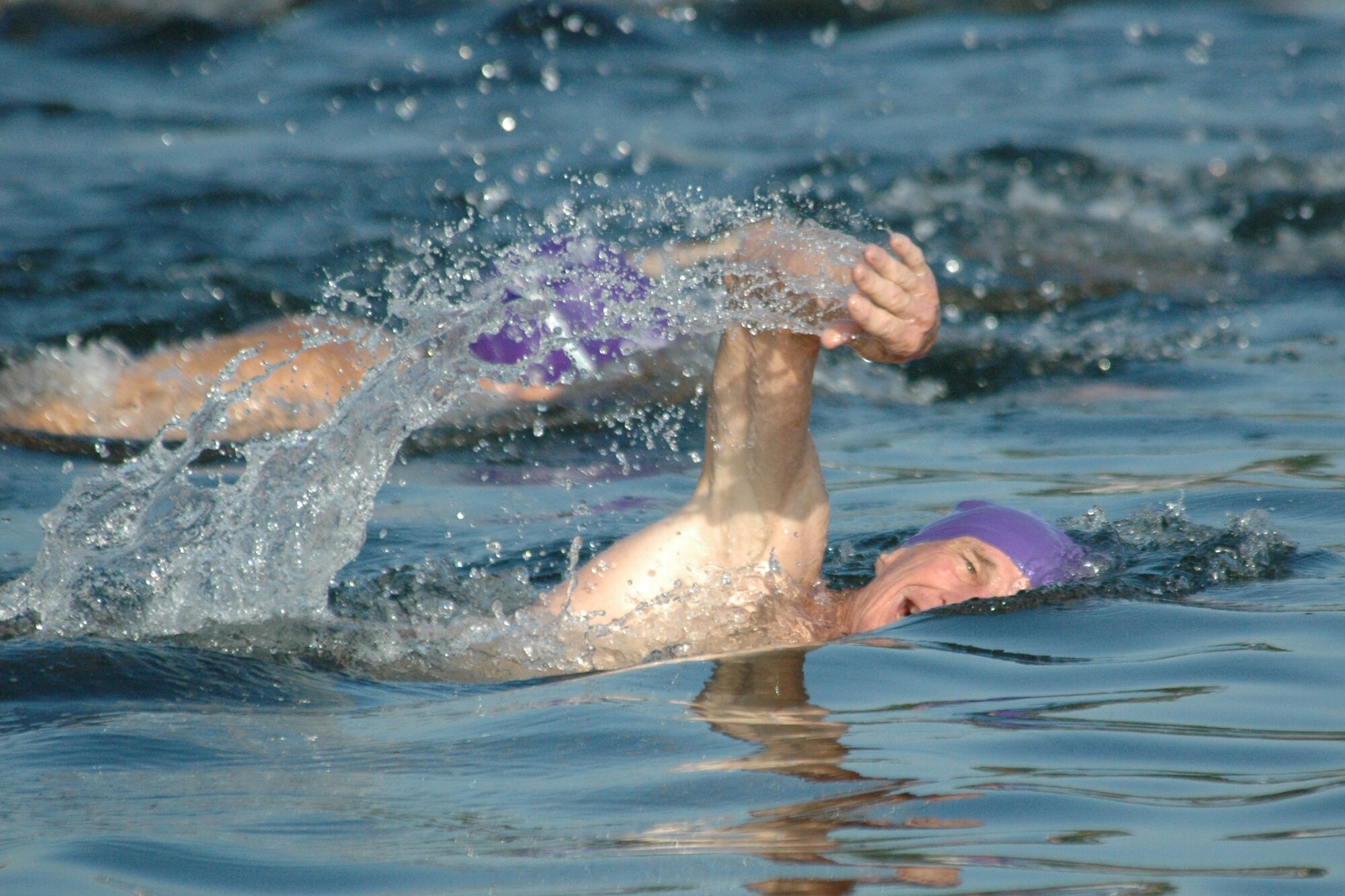 EGLIN AIR FORCE BASE, Fla. -- Wayne McSheehy, 75, competes as one of the oldest competitors in the 8th Annual My First Tri triathlon at Post'l Point June 9. The triathlon featured a 200-meter swim, 8-mile bike ride and 2.5-mile run. A total of 150 out of the 248 triathletes were participating in their first triathlon. McSheehy, a Ft. Walton Beach resident, place 18th overall with a time of 50:42. (U.S. Air Force Staff Sgt. Mike Meares)
