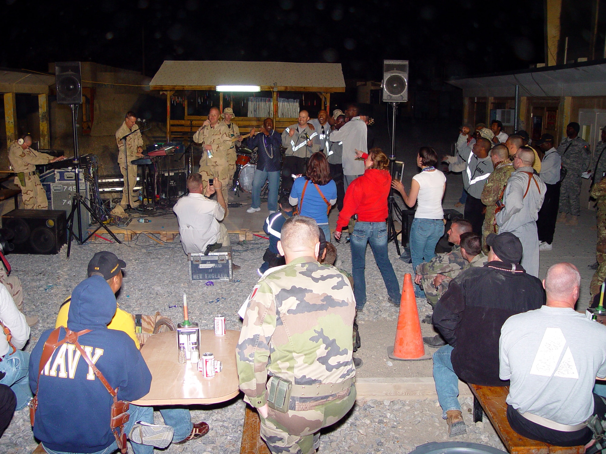 Max Impact, an Air Force Band emsemble, performs at Camp Alamo, Afghanistan, for the coalition troops there recently. Max Impact traveled throughout that region, playing for both American and international audiences alike. (U.S. Air Force photo) 
