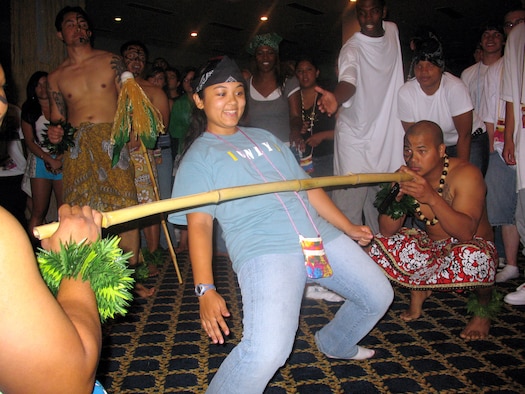 Samantha Smith, a 2007 Yokota High School graduate, limbos during Project Graduation June 7. The event gave the graduates an opportunity to celebrate the milestone in a safe environment. (U.S. Air Force photo/Senior Airman David Clark)
