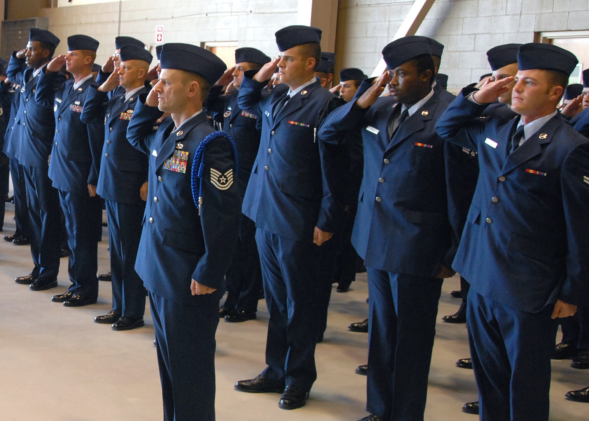 Members of the 361st Training Squadron salute during the change-of-command ceremony June 11. Lt. Col. Susan Santos passed on command of the 361st TRS to Lt. Col. Kelly Scott. (U.S. Air Force photo/Mike Litteken)