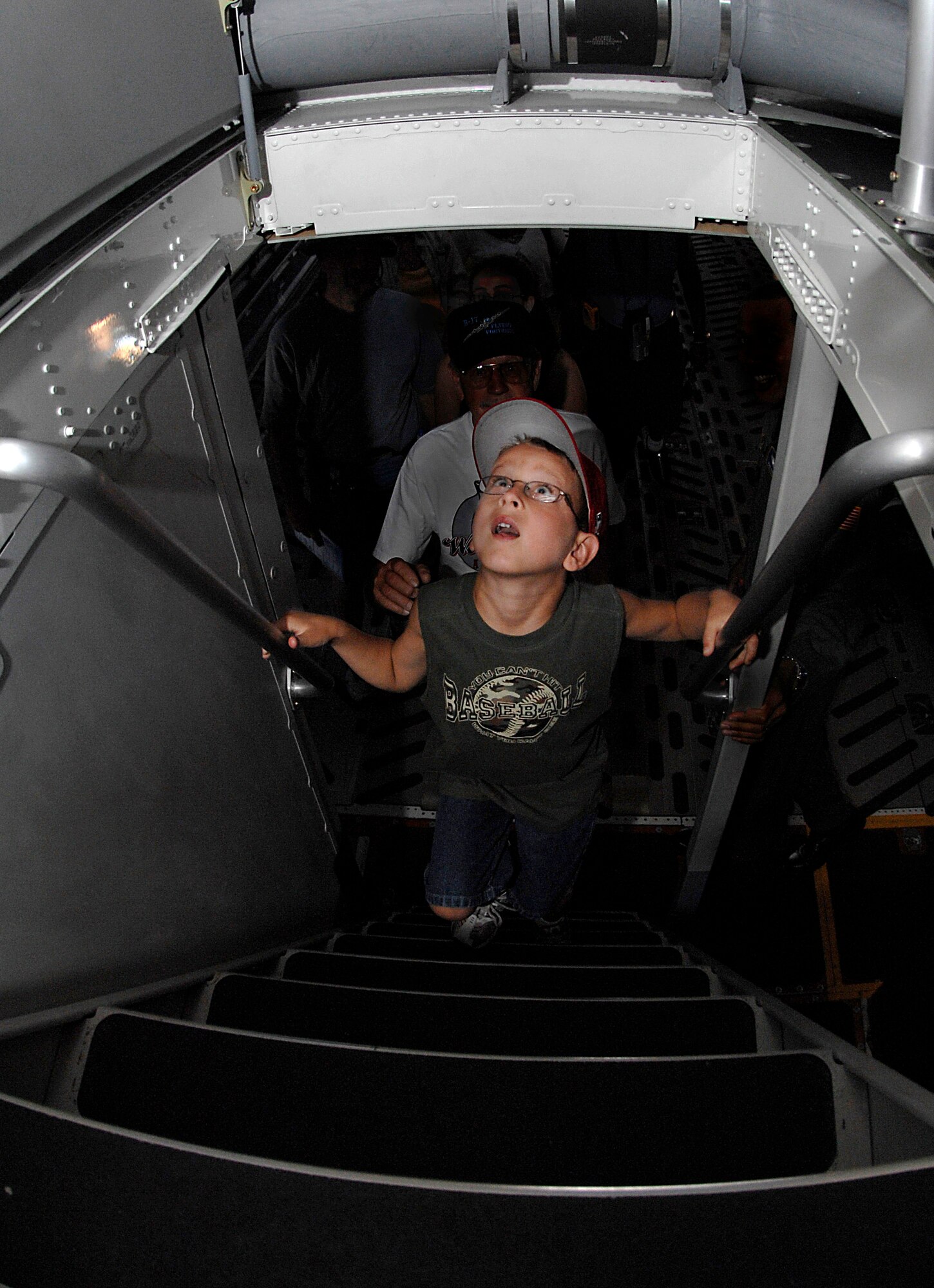 Michael Schoonmaker,7,  takes a moment to view the inside of a C-17 Globemaster III at the California Capital Air Show in Sacramento, Calif., on Jun. 9. The air show was the last event of Air Force Week California. The purpose of Air Force Week is to inform and educate the American public about the importance and roles of the Air Force in America's national defense.  Over 50,000 people attended the air show featuring the Air Force Thunderbirds and numerous Air Force aircraft. (U.S. Air Force photo/Tech. Sgt. Larry A. Simmons)