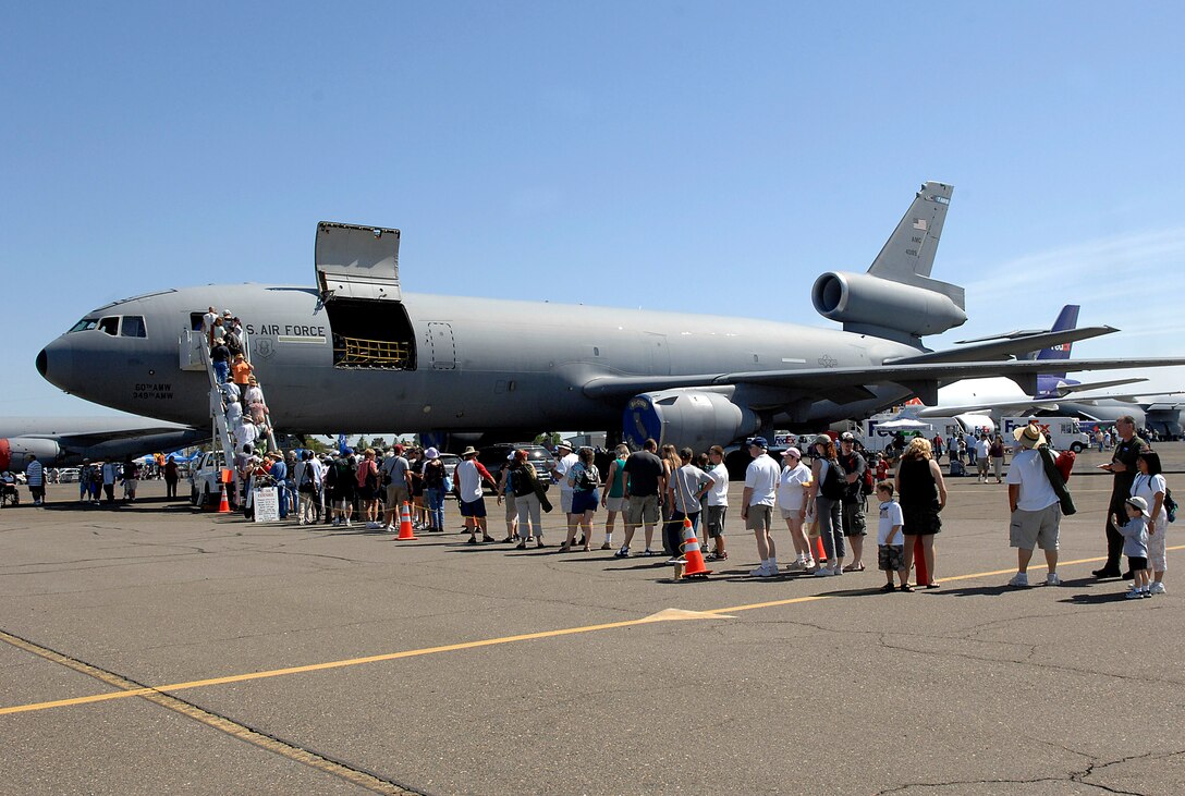 People line up to see the inside of a KC-10 Extender at the California Capital Air Show in Sacramento, Calif., June 9. The air show was the last event of Air Force Week California. The purpose of Air Force Week is to inform and educate the American public about the importance and roles of the Air Force in America's national defense. More than 50,000 people attended the air show featuring the Air Force Thunderbirds and numerous Air Force aircraft. (U.S. Air Force photo/Tech. Sgt. Larry A. Simmons)
