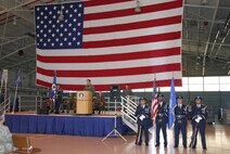 The 440th Airlift Wing honor guard stands by during the wing's relocation ceremony June 9, 2007, at Gen. Mitchell International Airport Air Reserve Station in Milwaukee. The motto on the wing flag is Nunquam Non Paratus ? ?Never unprepared." (U.S. Air Force photo/Joe Oliva)