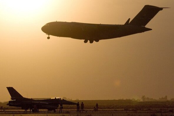 The sun sets on the first year of the 816th Expeditionary Airlift Squadron's time at the 379th Air Expeditionary Wing. The 816th EAS has flown about 370,000 passengers, 370 million pounds of cargo on 80,000 pallets and about 20,000 of flying. (U.S. Air Force photo)