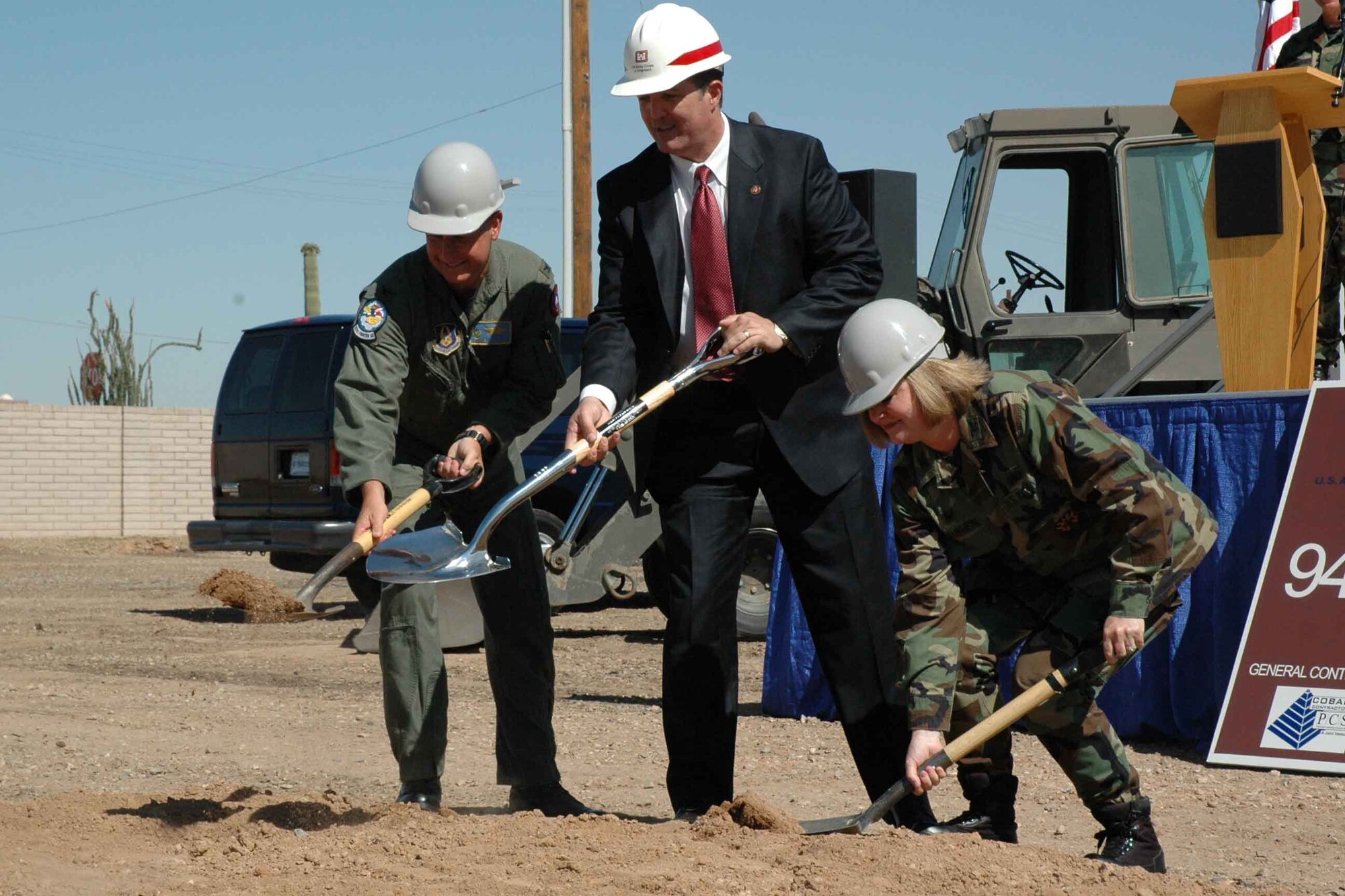 FROM LEFT: Col. Derek Rydholm, 944th Fighter Wing commander; Congressman Trent Franks, 2nd District, Arizona; and Col. Sharon Sounhein, 944th Mission Support Group commander, break ground May 30 for the new 944th Civil Engineer Squadron building. The 20,188 square foot building is scheduled to be complete in April 2008. Photo by Tech. Sgt. Susan Stout