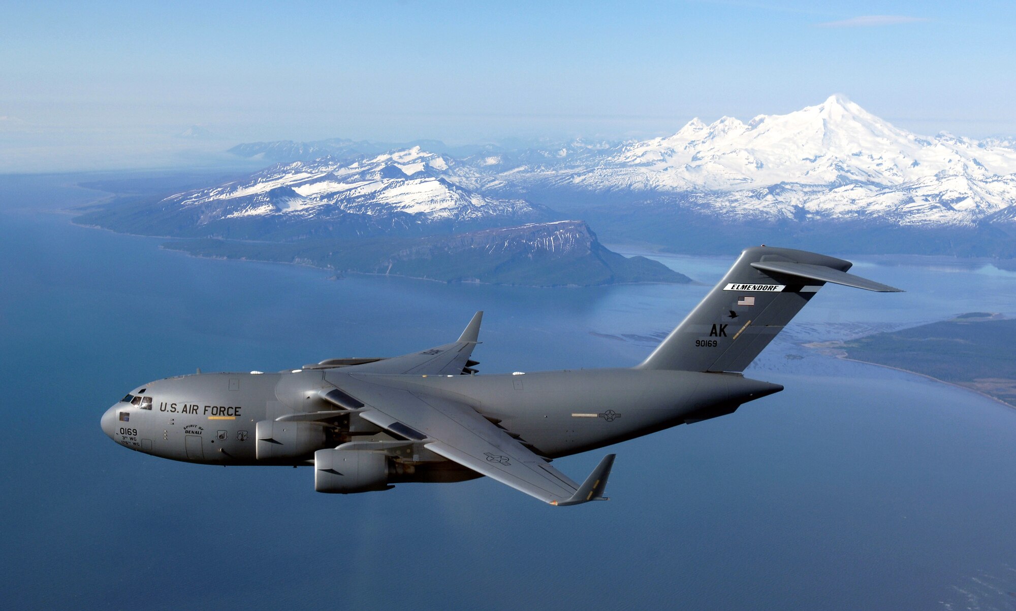 The "Spirit of Denali" flies over the Alaska Range June 11 en route to Elmendorf Air Force Base, Alaska.  This C-17 Globemaster IIIs was the first of eight to be stationed at Elmendorf.  The airlifters will be flown by both active duty aircrews in the 517th Airlift Squadron and by Air National Guard aircrews in the 249th Airlift Squadron. (U.S. Air Force photo/Tech. Sgt. Keith Brown)