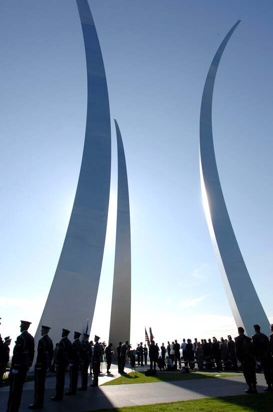 Beneath the spires of the Air Force Memorial, in Arlington, Va., Air Force Chief of Staff T. Michael Moseley awarded six Airmen the new Air Force Combat Action Medal June 12. The decoration is the first of its kind for the Air Force. The medal was designed for Airmen who have been directly in harm's way, engaging enemy forces. 
(U.S. Air Force photo/Staff Sgt. Brian Ferguson)