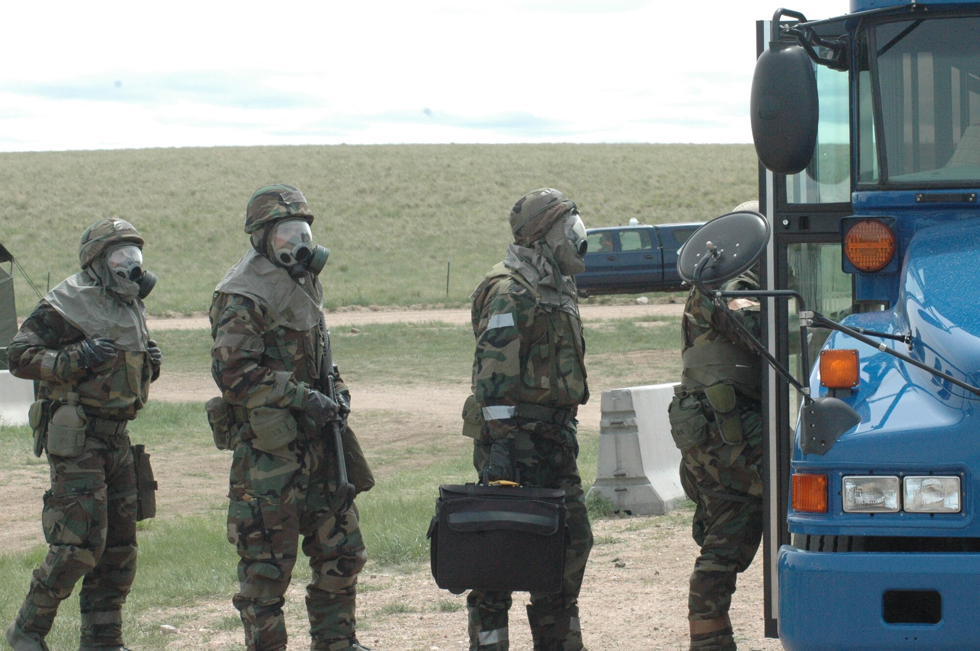 Participants in the exercise who were “contaminated” during the simulated missile attack were bused from the deployed site to a separate location to go through decontamination procedures.