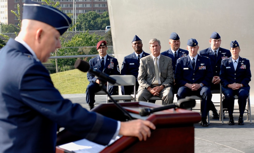 Air Force Chief of Staff Gen. T. Michael Moseley speaks to the crowd before the Air Force Combat Action Medals were presented to six Airmen. They were the first to receive the medal in a ceremony held at the Air Force Memorial in Arlington, Va. (U.S. Air Force photo/Staff Sgt. Brian Ferguson) 
