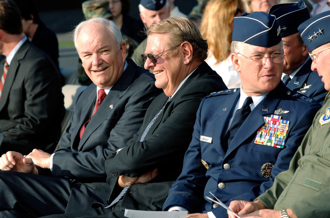 Secretary of the Air Force Michael W. Wynne(left) and other dignitaries were on hand as the Air Force Combat Action Medal was presented to six Airmen. They were the first to receive the medal in a ceremony June 12 at the Air Force Memorial in Arlington, Va. (U.S. Air Force photo/Staff Sgt. Brian Ferguson) 