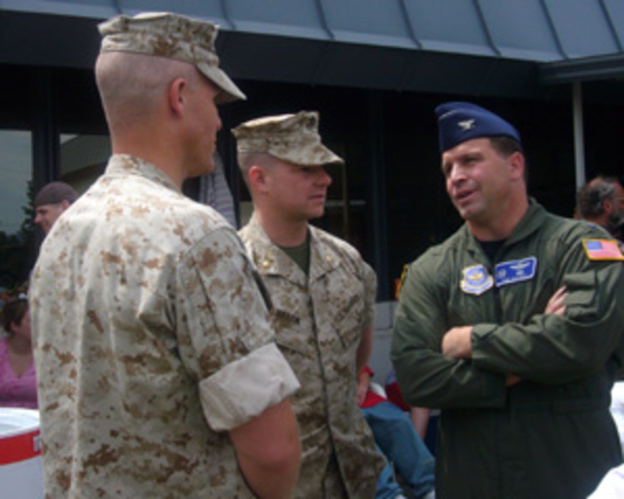 FAIRCHILD AIR FORCE BASE, Wash. -- Col. Thomas Sharpy, 92nd Air Refueling Wing commander, talks to Marines June 9 during an event held for more than 150 local deploying Marines and their families held at the U.S. Naval & Marine Corps Reserve Center. Several people from Fairchild and Operation Spokane Heroes, a local community organization, were on hand to bid farewell to the Marines. (U.S. Air Force photo/Capt. Jason McCree)
