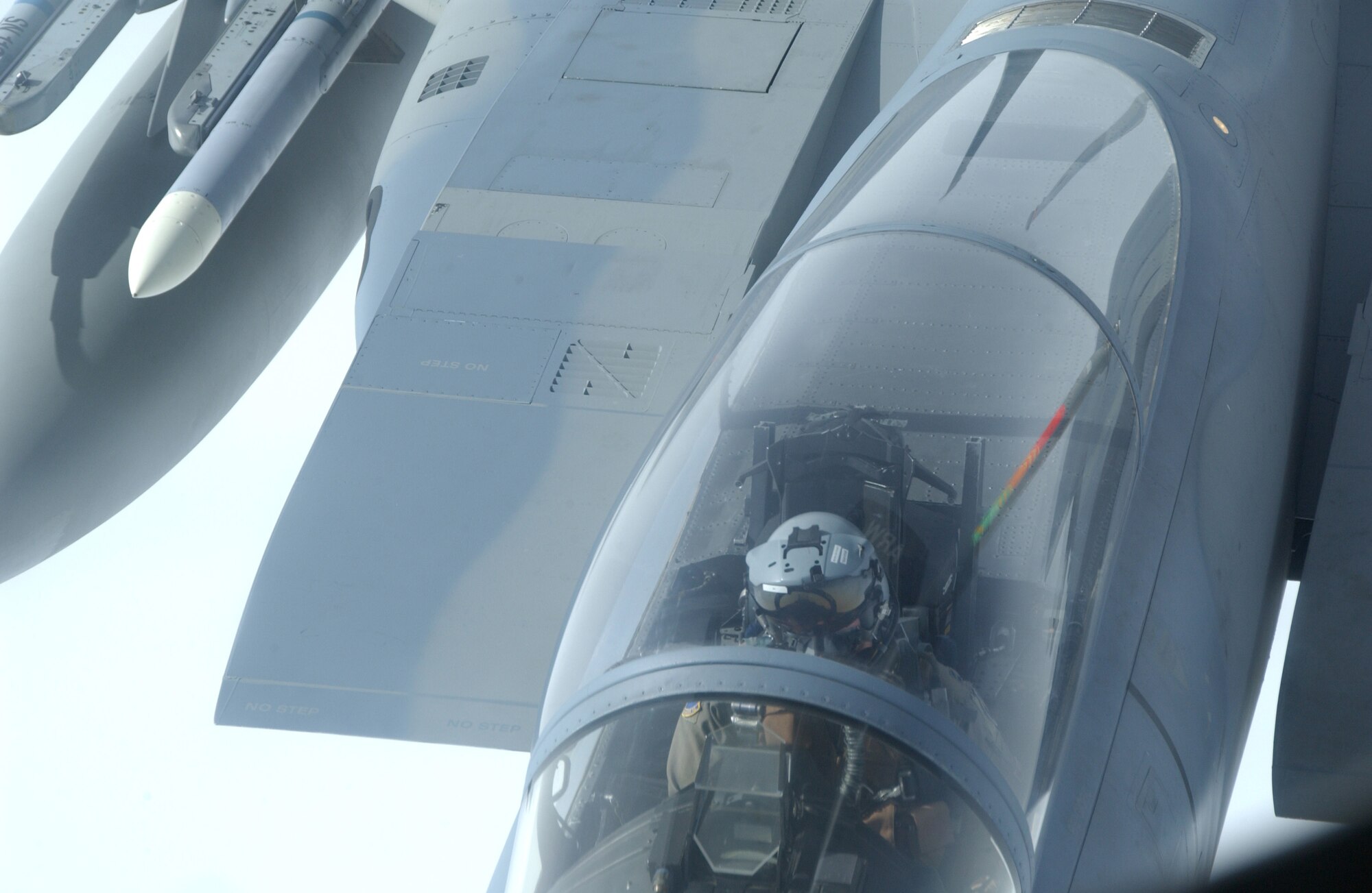 EIELSON AIR FORCE BASE, Alaska -- An F-15C fighter pilot comes to refuel his aircraft so he can continue his training exercise during Red Flag 07-02 June 7. Red Flag-Alaska, a series of Pacific Air Forces commander-directed field training exercises for U.S. forces and allies, provides joint offensive counter-air, interdiction, close-air support and large-force employment training in a simulated combat environment.
 (U.S. Air Force photo by Airman 1st Class Christopher Griffin)