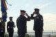 ARLINGTON, Va. -- Chief of Staff of the Air Force Gen. T. Michael Moseley presents the Air Force Combat Action Medal to Master Sgt. Charlie Peterson, who received the medal for heroic actions while deployed on convoy duty in 2004.  The medal was presented for the first time to six Airmen at the ceremony held at the Air Force Memorial today.