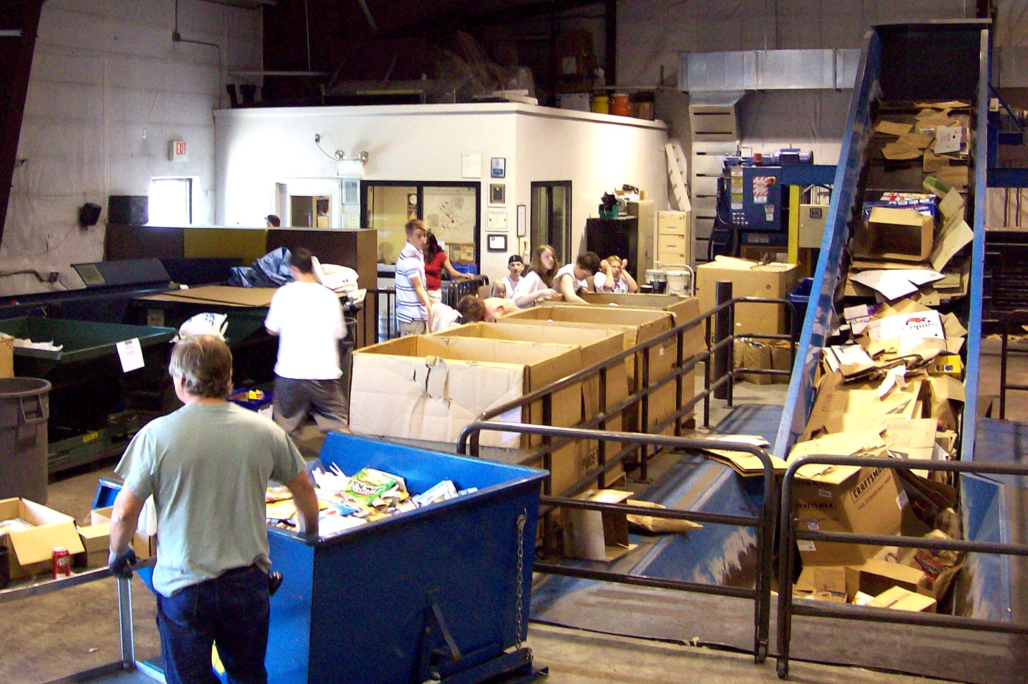 FAIRCHILD AIR FORCE BASE, Wash. – The base Recycling Center is abuzz as volunteers from the Teen Center and students from Michael Anderson Elementary School bring in recyclable items as they compete in a recycling contest June 2. (U.S. Air Force photo/ Diane Wulf)