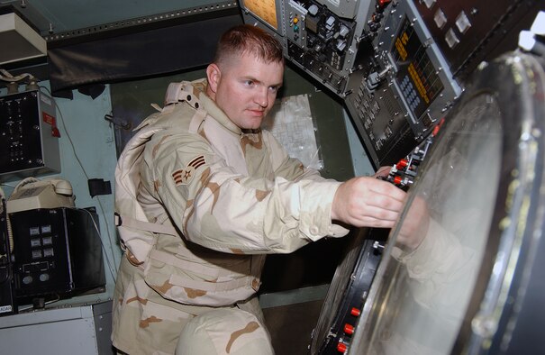 Senior Airman Manchester performs preventative maintenance on a UPA-59 decoder during a daily inspection of one of the TPS-75 air control and warning radar at Balad Air Base, Iraq. Airman Manchester, a 727th Expeditionary Air Control Squadron radar maintenance technician, is deployed from Hill AFB, Utah. (U.S. Air Force photo by Senior Airman Olufemi A. Owolabi)