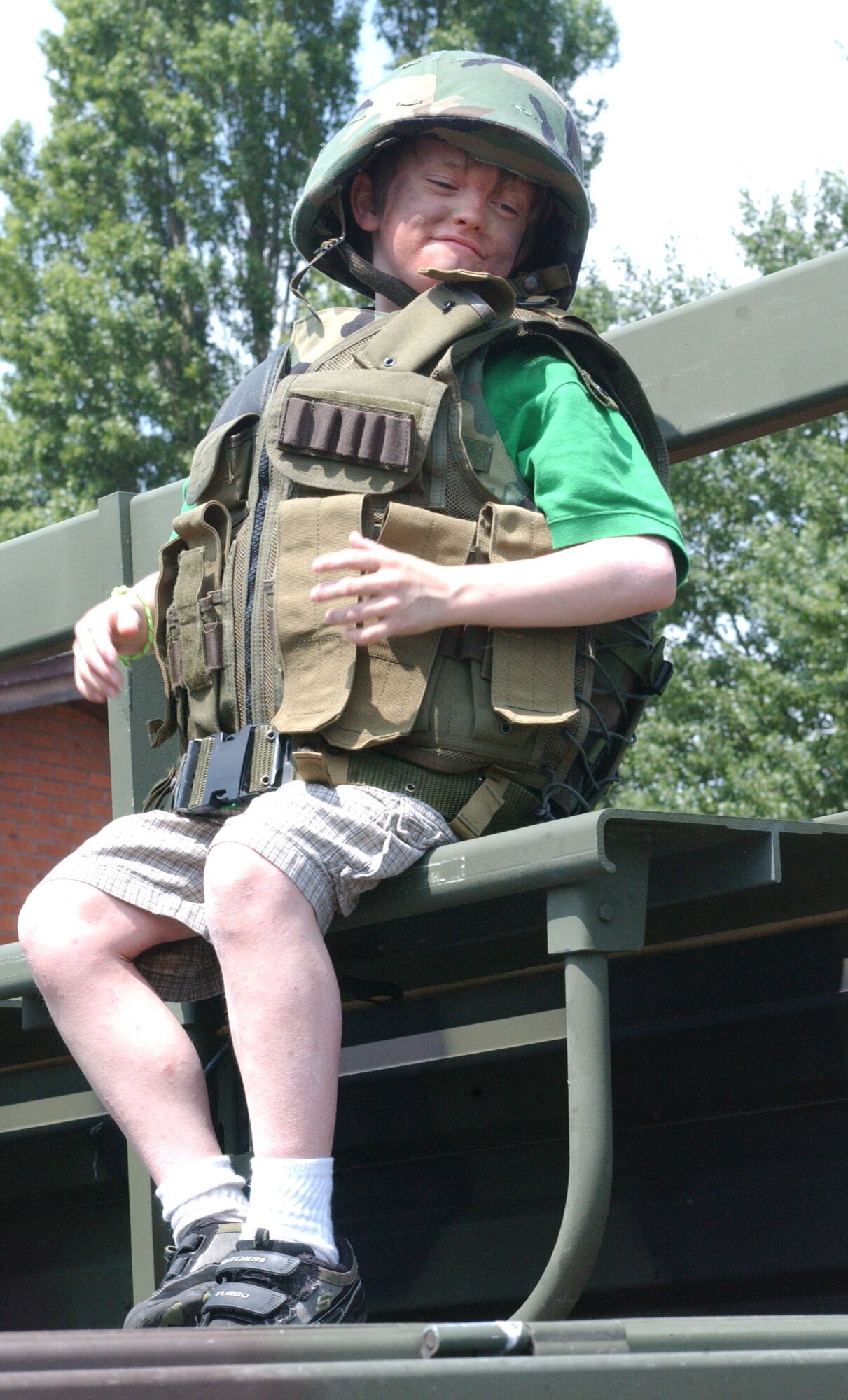 Matthew Chambers, 9, wears a Military bulletproof vest during the Operation Together & Ready activicty held at the base child development center at RAF Mildenhall June 9, 2007. (U.S Air Force photo by Airman Brad Smith)                                     