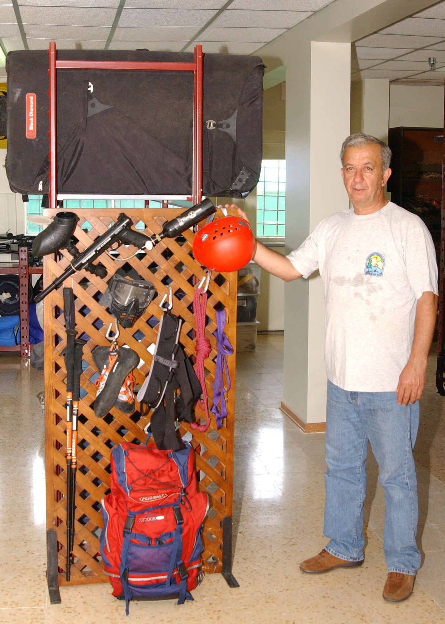 Mustfa Tasli shows the many different kinds of Outdoor Recreation equipment for rent at Incirlik Air Base.  (U. S. Air Force Tech. Sgt. Patrick Hyde)                           