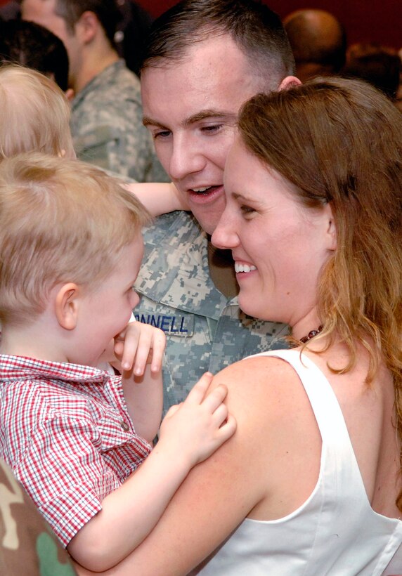 Airmen returning from a deployment usually find their permanent duty station a welcome sight.  But they and their families may find that adjusting to life after deployment can be challenging. The Air Force has programs to help Airmen and their families deal with these changes and other aspects of their return.  (U.S. Air Force photo/Daren Reehl) 