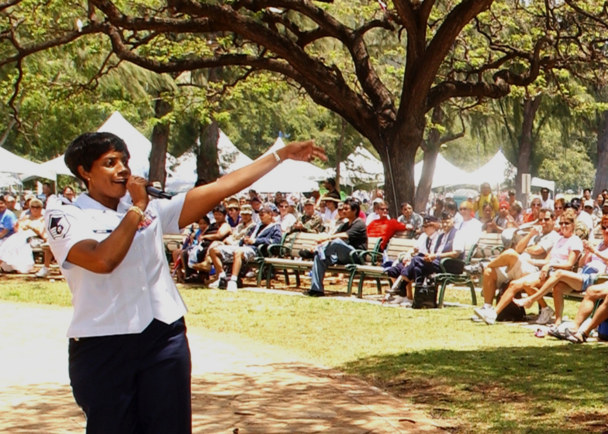 HONOLULU, Hawaii -- Master Sgt. Debra Jamison, vocalist, supervisor and resource advisor for The United States Air Force Band of the Pacific - Hawaii, belts out a tune to a local audience here Feb. 3. Sergeant Jamison acted as the First Sergeant for Pacific Air Forces for two weeks recently, the first time someone without a diamond filled in. (USAF photo by Master Sgt. Tim Brye)