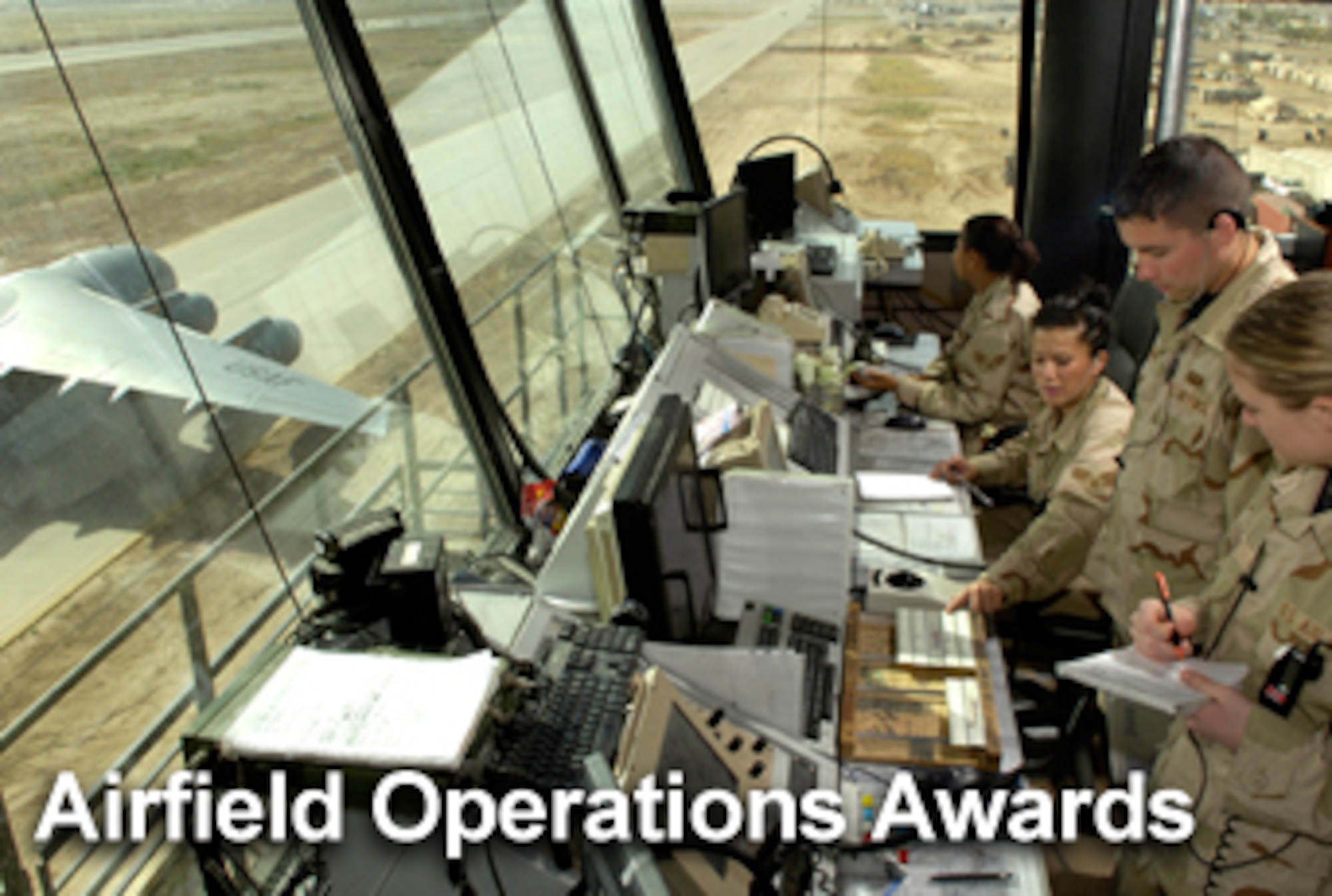 Air Force officials announce Airfield Operations Awards.  (U.S. Air Force photo/Staff Sgt. Brian Ferguson)