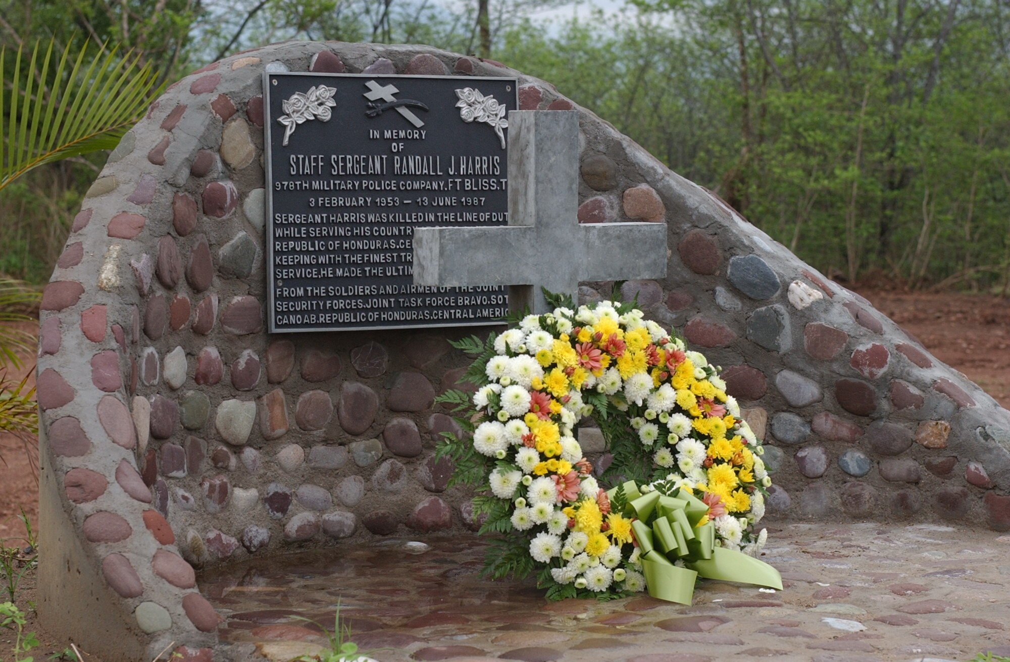 SOTO CANO AIR BASE, Honduras – A wreath rests at the memorial monument in honor of Army Staff Sgt. Randall J. Harris, who died from wounds suffered in the line of duty here on June 13, 1987.  Sergeant Harris was deployed here from the 978th Military Police Company at Fort Bliss, Texas.  Each year, Joint Task Force-Bravo holds a memorial service in remembrance of Sergeant Harris.   (U.S. Air Force photo/Tech. Sgt. Sonny Cohrs)