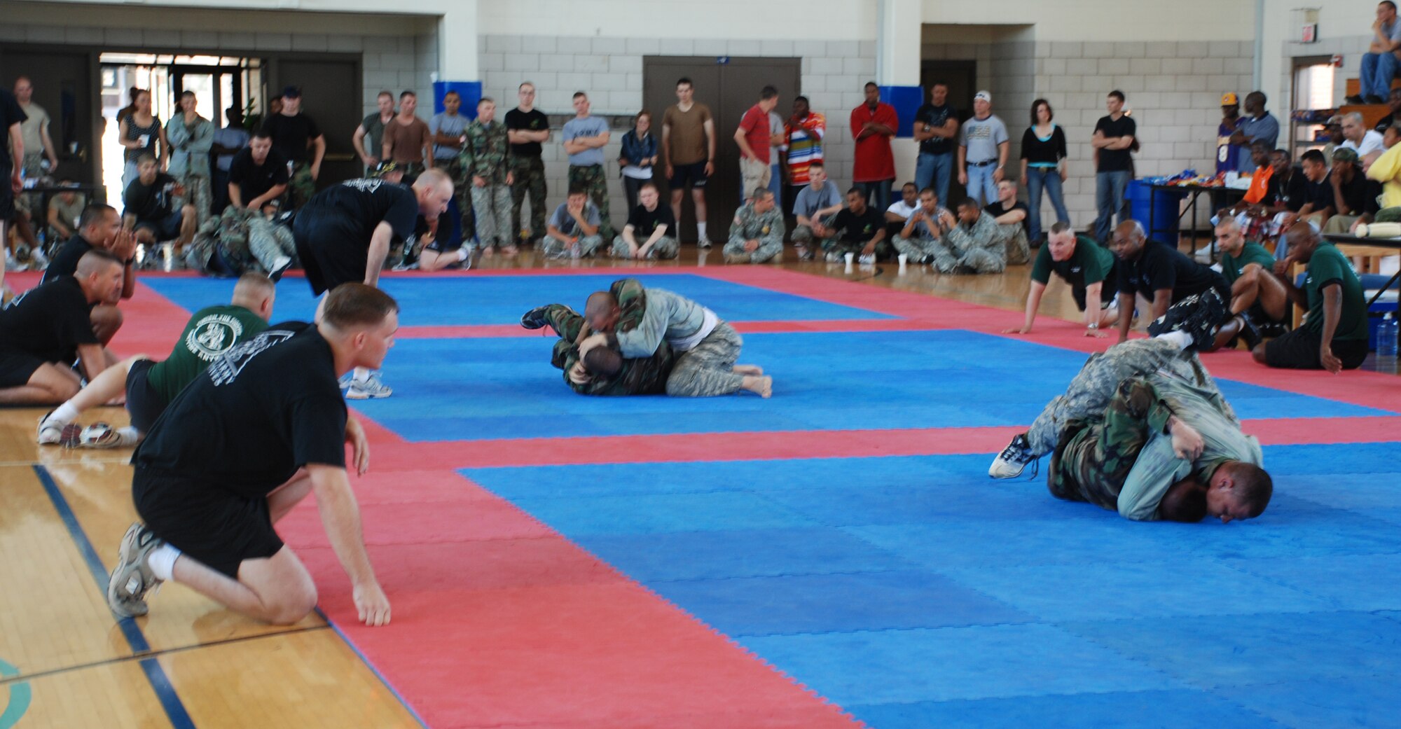Participants in the Modern Army Combatives Tournament compete at the Hackney Fitness Center June 9. (U.S. Air Force photo/Airman 1st Class Jacob Corbin)